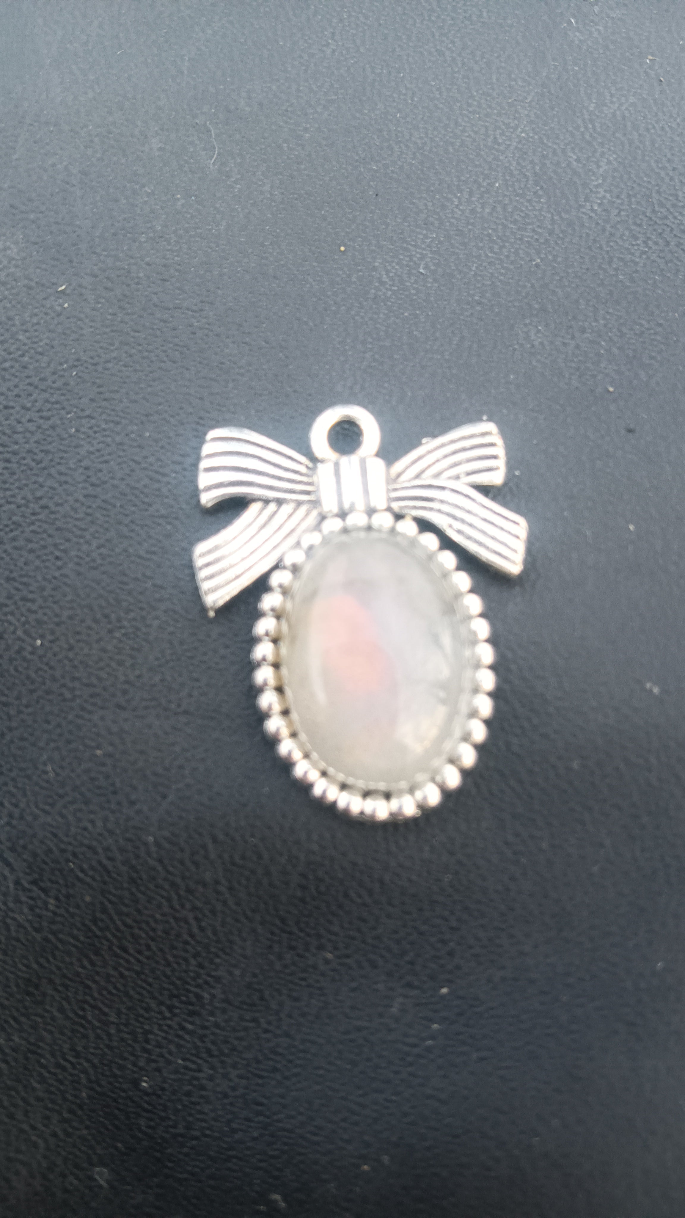 Rare pink flash labradorite oval pendant - handcrafted collector gemstone jewelry