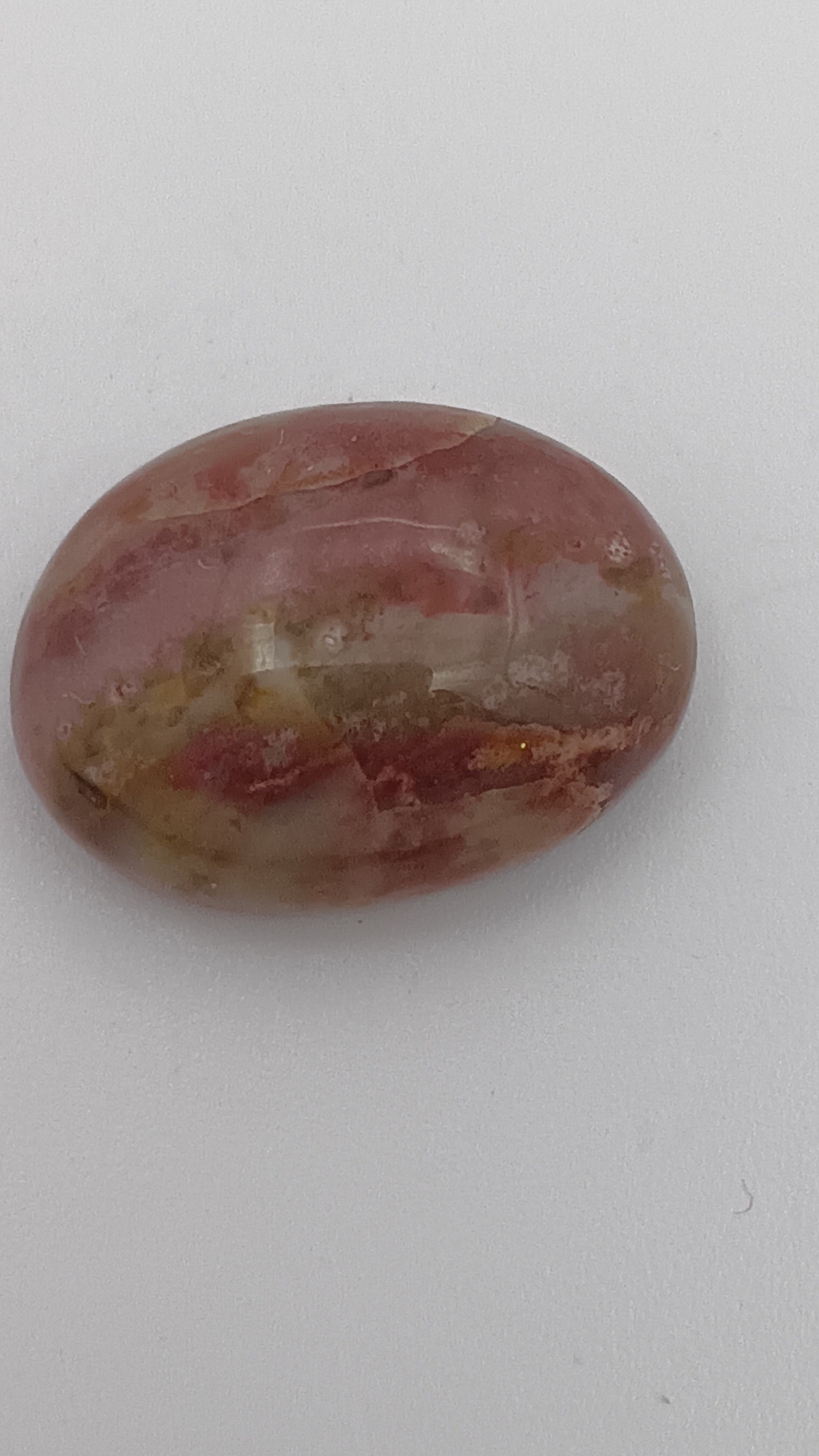 Red Montana jaspagate oval side view showing natural color pattern by Jones Stones USA
